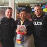 Happily serving on McHappy Day with York Regional Police officers to raise money for charities